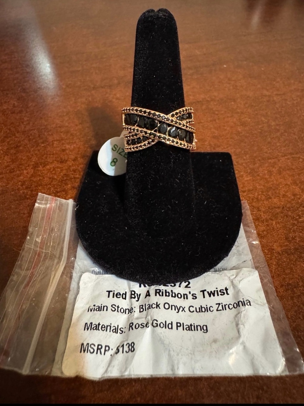 Tied By A Ribbon's Twist Rose Gold Plated Ring with Black Onyx CZ